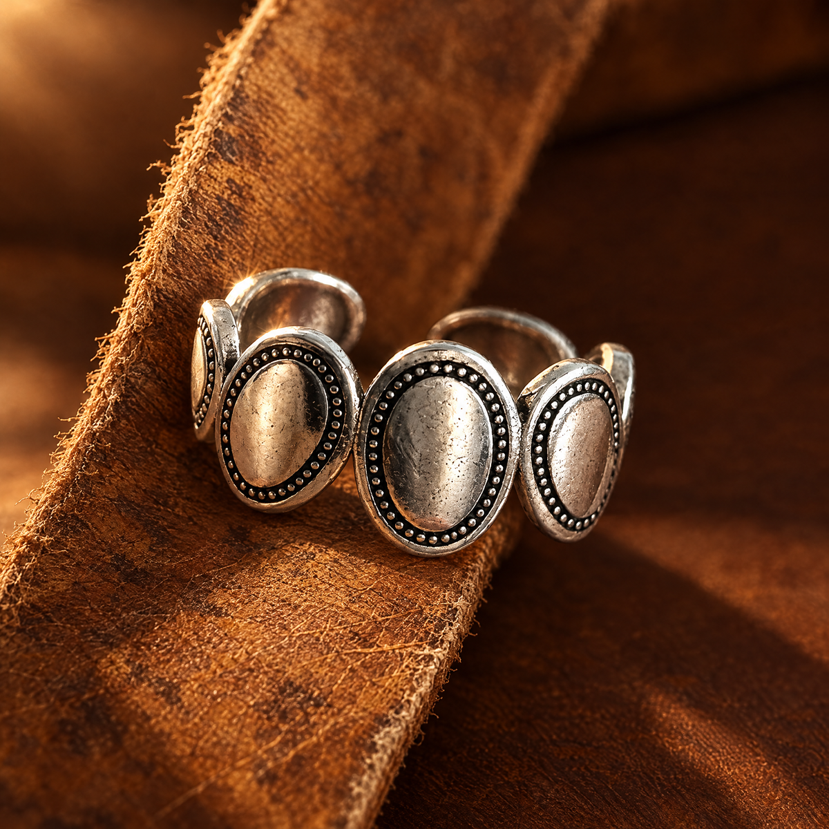 Silver Sage Ring on a leather strip